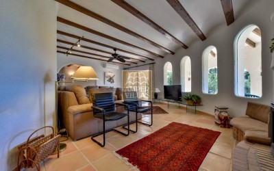 A beautiful villa in a peaceful, green setting.